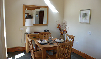 Dining area of Dan Castell Holiday Cottage