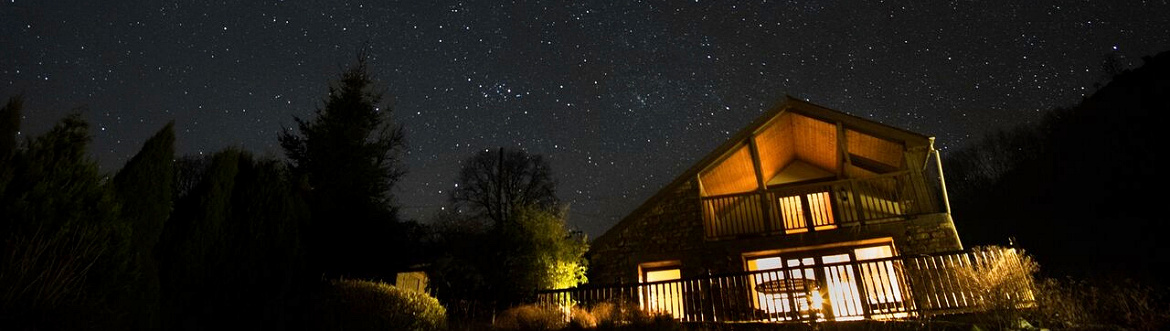 Dan Castell Holiday Cottage at night in the stars